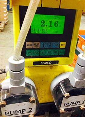 The plating line's automatic pH control unit, its display reading 2.16 above the two dosing pumps