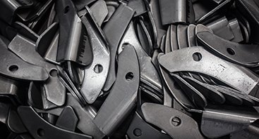 A pile of zinc-iron plated steel stampings