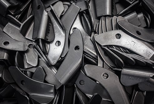 A pile of zinc-iron plated steel stampings